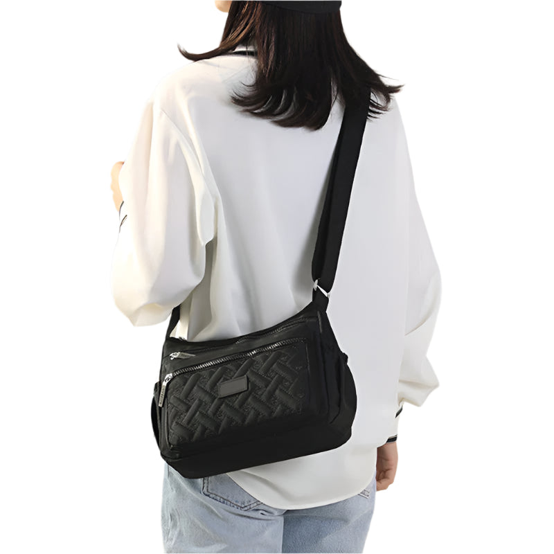 Clara - Lett skulderveske med justerbar stropp og glidelåslommer