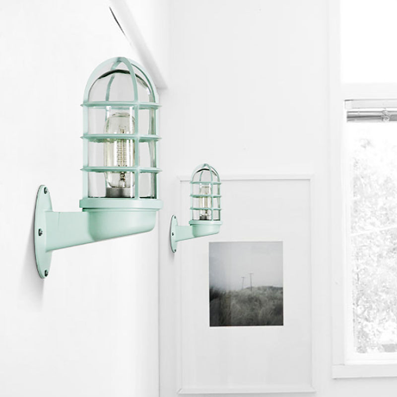 CageGlow - Industriell vegglampe med feste i klart glass