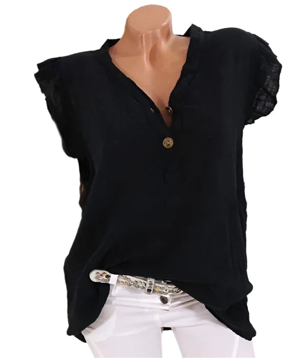 Connie - Feminin bluse med V-hals og rysjer nederst