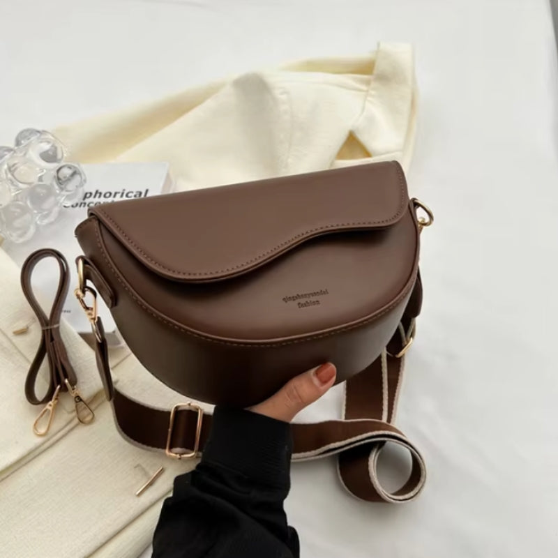 Lina elegant skulderveske med bred stropp og luksuriøst design