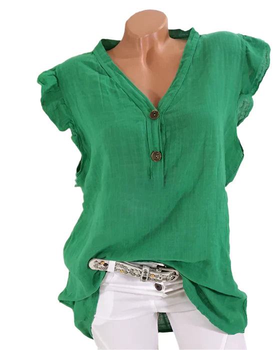 Connie - Feminin bluse med V-hals og rysjer nederst