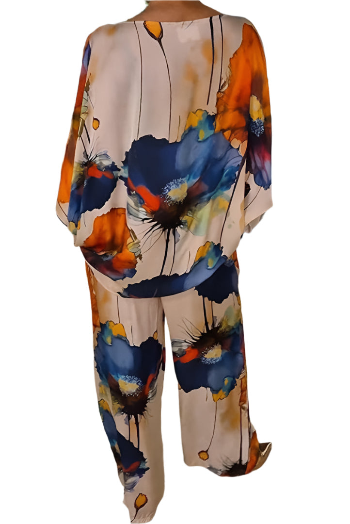 Geldy - Kraftig blomstret topp med oversized og bukser med vide ben