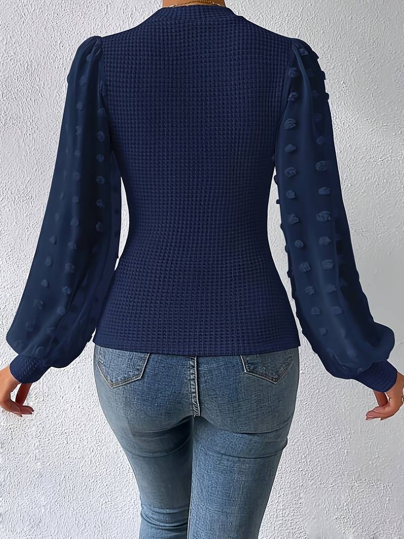 Grete - Vaffelstrikkede ermer med rund hals og trendy design