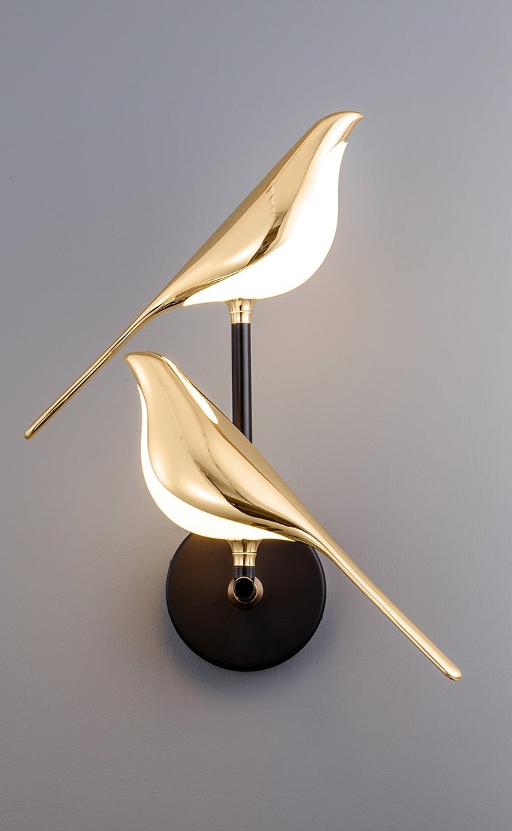 Vegglampe med fugl