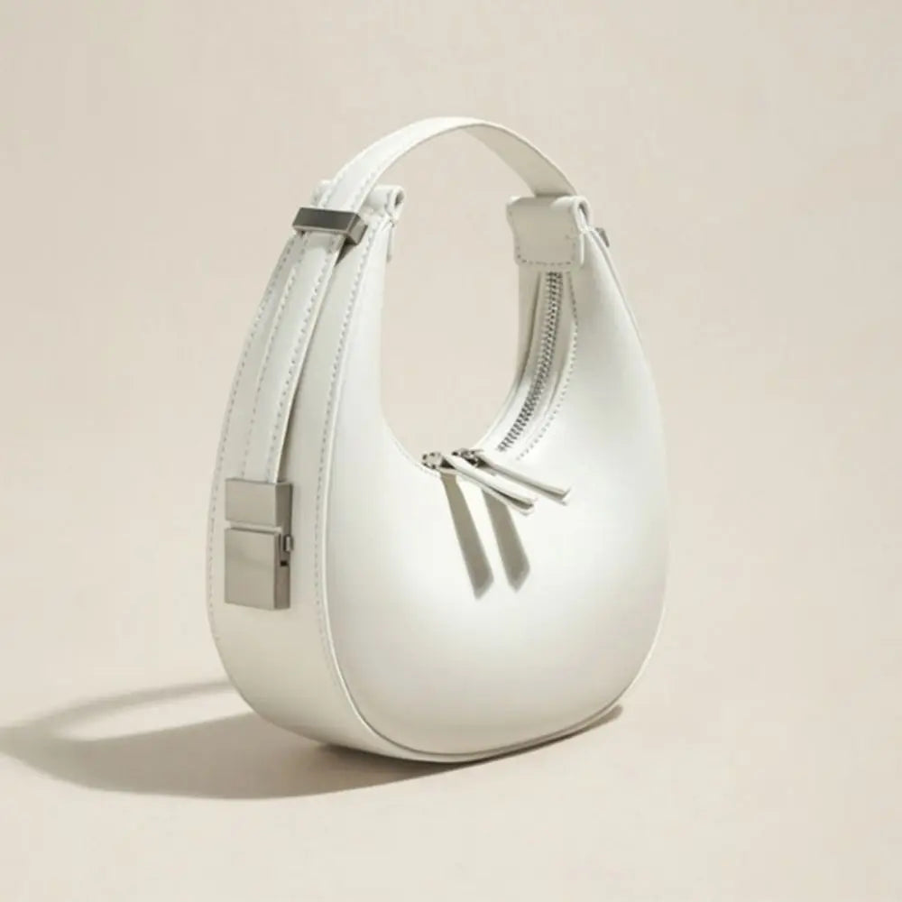 Halvmåneveske i minimalistisk stil