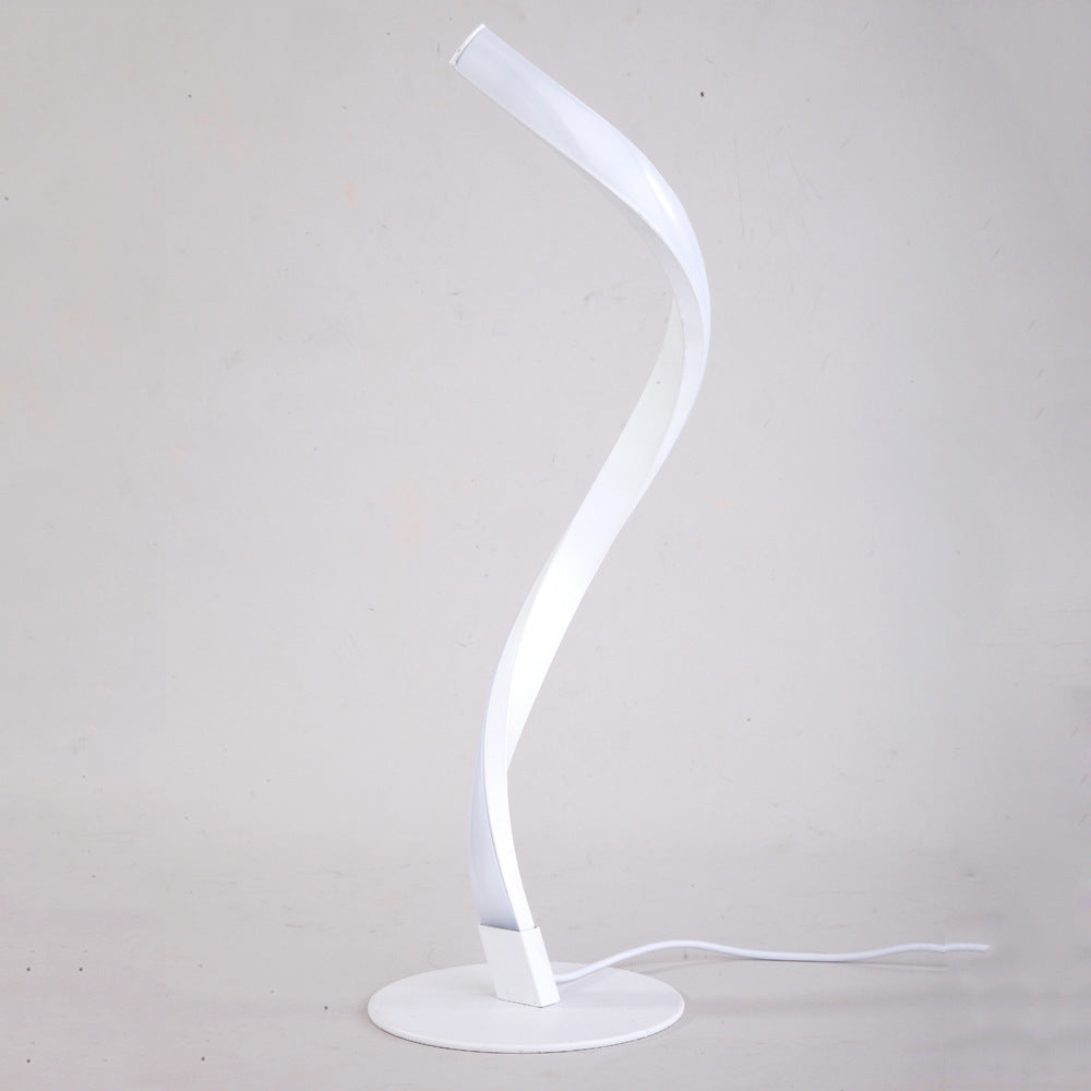 LumiSwivel - Moderne LED-bordlampe med dreibart design