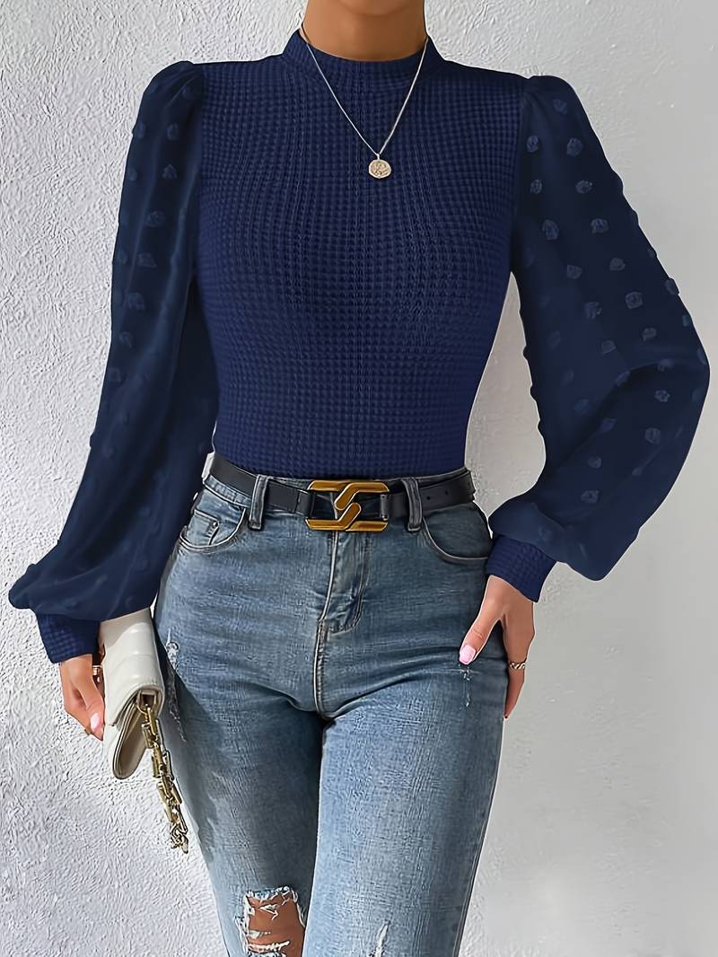 Grete - Vaffelstrikkede ermer med rund hals og trendy design