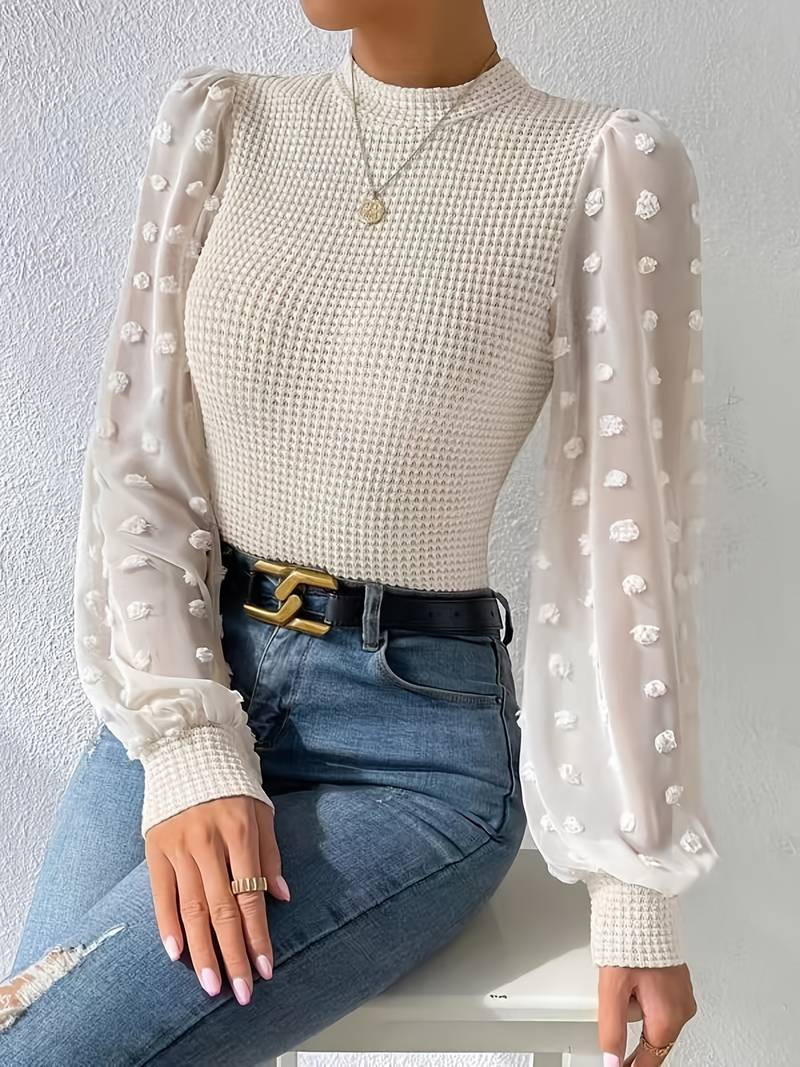 Grete - Vaffelstrikkede ermer med rund hals og trendy design