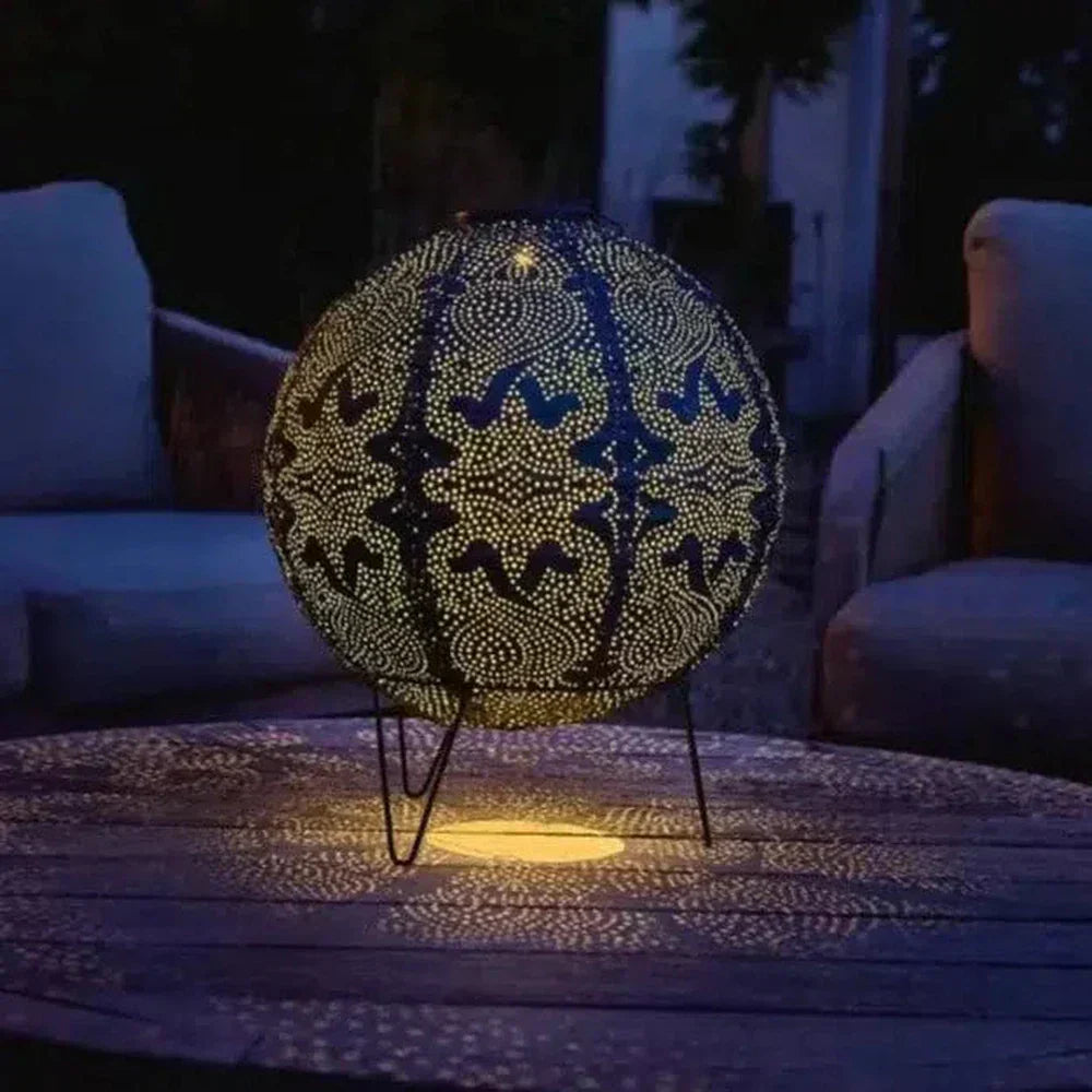 MosaicLume - utsmykket sfærelampe med intrikat utskjæringsdesign