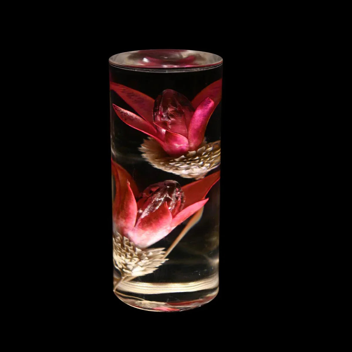 FloraGlow - LED skrivebordslampe med gjennomsiktig sylindrisk sokkel fylt med blomster