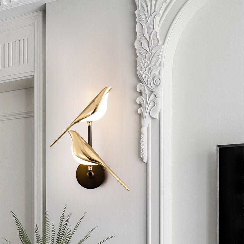 Vegglampe med fugl