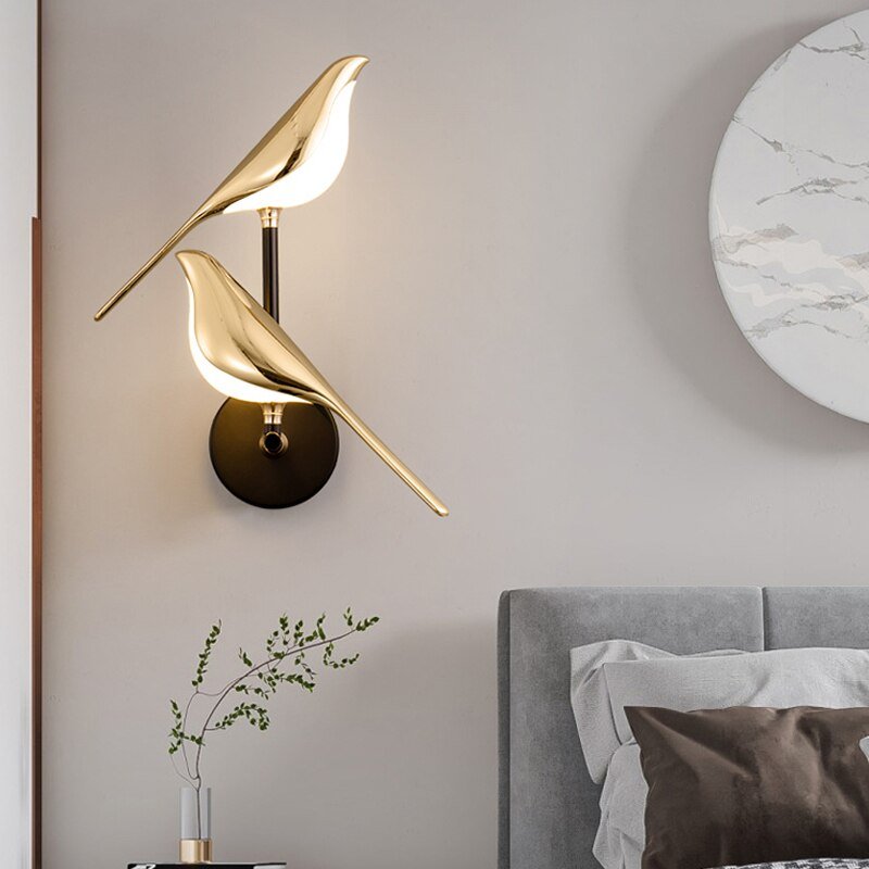 Vegglampe med fugl